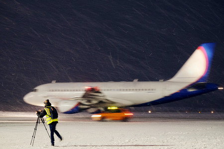 Moscow, Russia, February, 09,2015: photographer on the runway in winterのeditorial素材