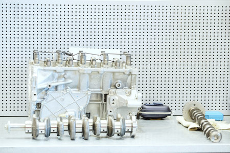 The image of a camshaft of car engine