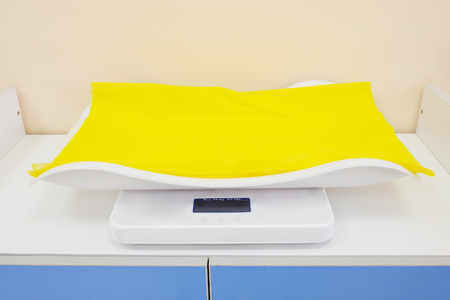 Electronic baby scale in the office of a pediatricianの写真素材