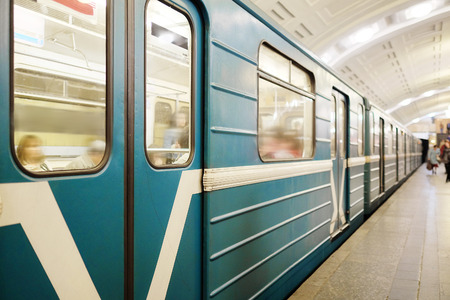 MOSCOW, RUSSIA  -  APRIL 12, 2015: Sokolnicheskaya line - the first line of the Moscow metro. Station of the Moscow metro "Lenin Library". Arrival of a trainのeditorial素材