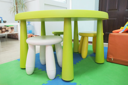 Colorful plastic kid chairs and tableの写真素材