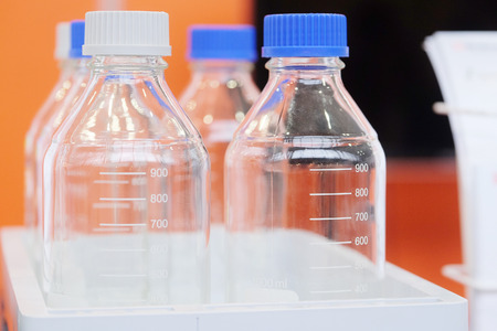Laboratory equipment. Bottles of chemicals in the laboratoryの写真素材