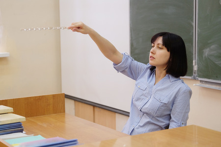 The image of a girl teacher in a classの写真素材