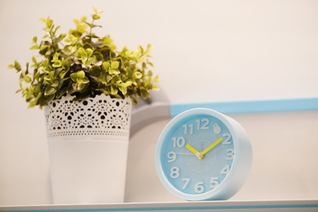 The image of flowers and alarm clocksの写真素材