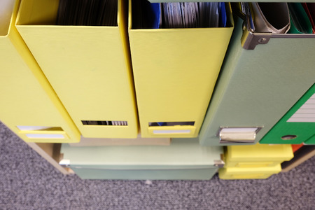 The image of folders on a shelfの写真素材
