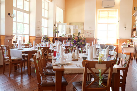 Cafe interior with the served tablesの写真素材