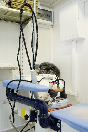 Professional iron in a hospital laundryの写真素材