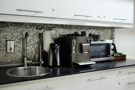 Interior of the bar: coffee maker, kettle, microwaveの写真素材
