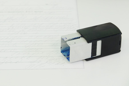 The image of a stamp on a tableの写真素材