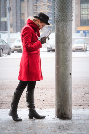 Girl in a red coatの写真素材