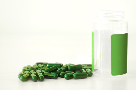 The image of pills on a tableの写真素材