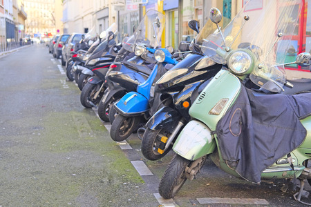 Paris, France, February 9, 2016: motorcycle parking on a street in a center of Paris, France. Motorcycles are very popular transport in Parisのeditorial素材