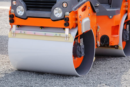 The image of a road rollers under the white background