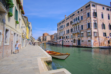 Venice, Italy, June, 21, 2016: landscape with the image of boats on a channel in Venice, Italyのeditorial素材