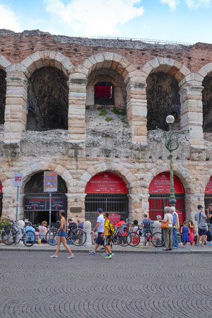 VERONA, ITALY - JULY, 2, 2016: people in the area infront of Arena of Verona (in Italian it is called Arena di Verona) -ancient amphitheatre used today as a stage for concerts and Opera performancesのeditorial素材
