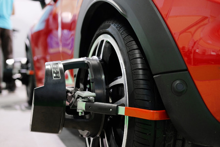 Wheel alignment equipment on a car wheelの写真素材