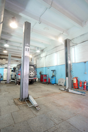 Moscow, Russia - August, 26, 2016: Car on a lift in a car repair station in Moscow, Russiaのeditorial素材