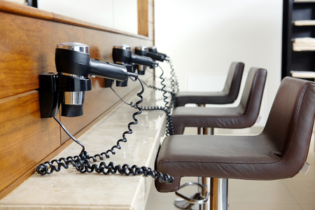 Hair dryers in a checkroomの写真素材