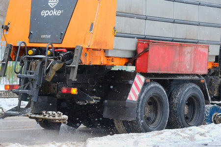 Moscow, Russia - November, 12, 2016: Snow removal machine on a snow-covered road after high...