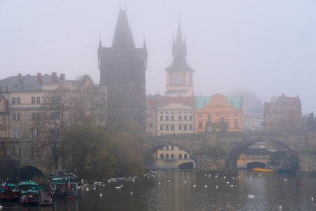Prague, Czechia - November, 21, 2016: morning fog on Vltava river in Prague, Czechia. There is Charles Bridge in the background.のeditorial素材