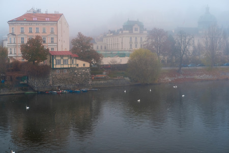 Prague, Czechia - November, 21, 2016: morning fog on Vltava river in Prague, Czechia.の写真素材