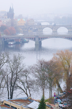 Prague, Czechia - November, 24, 2016: panorama of an old Prague, bridges and embankment of Vitava river, Czechiaの写真素材