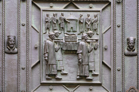 Prague, Czechia - November, 21, 2016: fragment of a door repousse of St. Vitus Cathedral in Prague Castle, Czechiaのeditorial素材