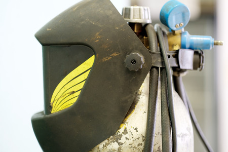 Welding helmet and gas cylinderの写真素材