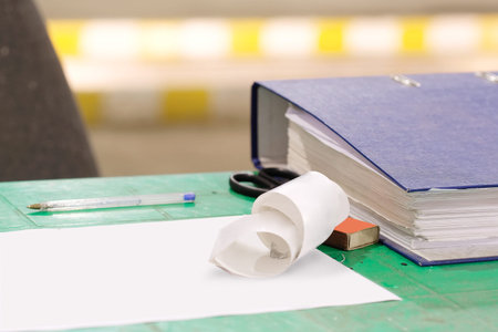 Folder with documents on an office tableの写真素材