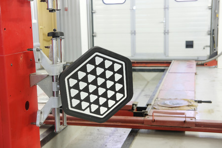 Wheel alignment equipment in a car repair stationの写真素材