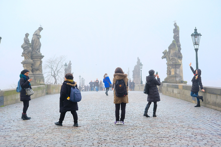 Prague, Czechia - November, 21, 2016: monument on Charles bridge in a center of Prague, Czechiaのeditorial素材