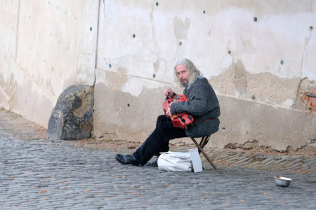 Prague, Czechia - November, 22, 2016: organ grinder in Prague, Czechia