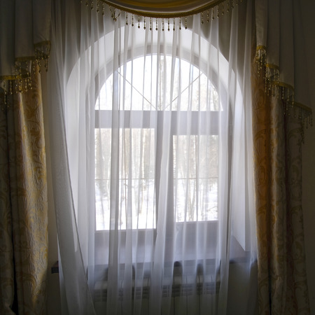window
window behind the curtainの写真素材