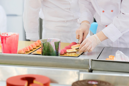 confectioner makes cakesの写真素材