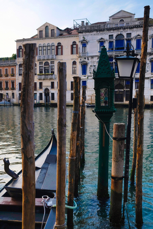 Venice, Italy, May, 31, 2017: landscape with the image of boats on a channel at sunrise in Venice, Italyの写真素材