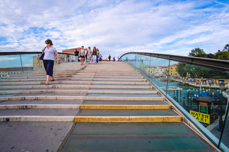 Venice, Italy - July, 28, 2017: Bridge over the channel in Venice, Italyのeditorial素材
