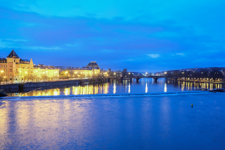 Prague, Czech Republic - November, 23, 2017: night view from the Charles bridge to the Vitava embankment in the center of Pragueのeditorial素材