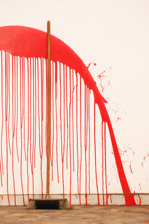 Red painting on a wall looks like the bloodの写真素材