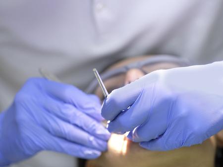 Dantist's hands close upの写真素材