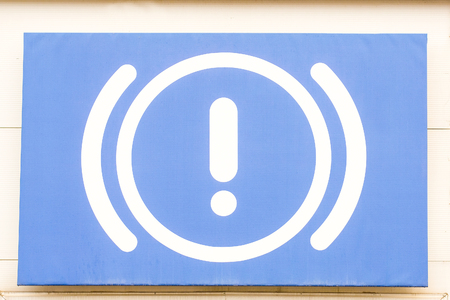 Blue sign of a brakesの写真素材