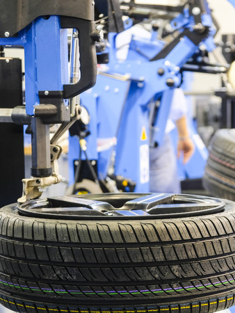 Modern tire machine in the service stationの写真素材