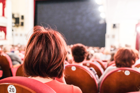 Spectators in a theatre hallの写真素材