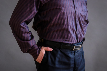 Man with hands in a pockets