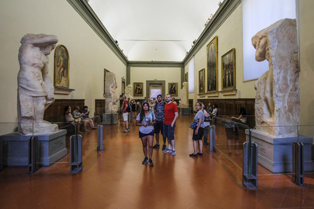 Florence, Italy - June, 3, 2018: Visitors in a museum of Florence Academy of fine arts (Accademia di belle arti di Firenze)のeditorial素材