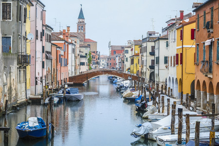 Sottomarina, Italy - July, 11, 2018: boats parked near embankment in Sottomarina, Italyのeditorial素材