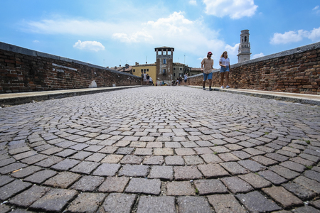 Verona, Italy - July, 15, 2018: bridge over Adige river in Verona, Italyのeditorial素材
