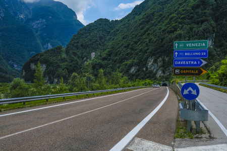 Longarone, Italy - July, 12, 2018: Alpine landscape with the image of mountain roadのeditorial素材