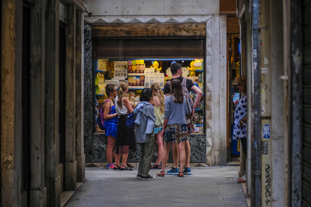Venice, Italy - Jine, 28, 2018: street shop on a pedestrian street in a center of Venice, Italyのeditorial素材