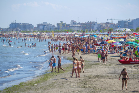 Sottomarina, Italy - June, 30, 2018: populous sand beach in Sottomarinaのeditorial素材