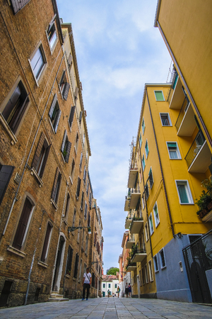 Venice, Italy - Jine, 28, 2018: pedestrian street in a center of Venice, Italyのeditorial素材